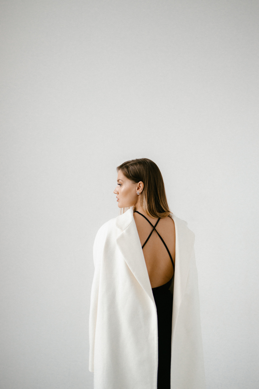 A Woman Wearing White Coat 